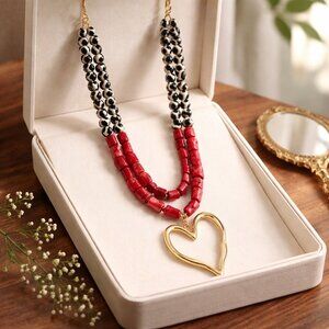 Red Coral and spotted agate beads with a Large Gold tone Heart Pendant Necklace